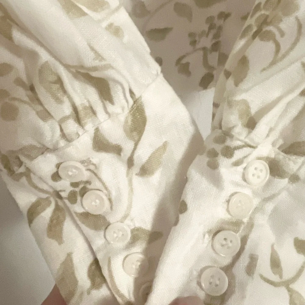 Reformation Smocked linen blouse